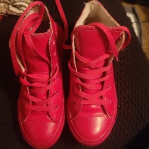 Girls size 1, very cute and unique pair of gently worn converse sneakers